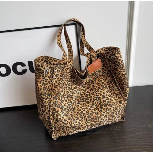 Bolsa de Ombro Leopardo em Lona: Estilo Retro com Contraste de Cores, Ideal para o Dia a Dia, Espaçosa e com Estampa de Leopardo, uma Tendência na Moda